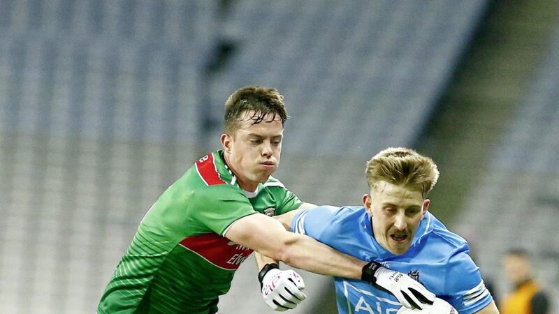 Dublin's Se&aacute;n Bugler and Mayo's Stephen Coen in action during the GAA Football All-Ireland Senior Championship Final between Dublin and Mayo at Croke Park Dublin on December-19-2020. Pic Philip Walsh.