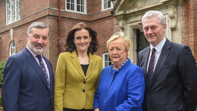 Secretary of State Theresa Villiers with panel members Monica McWilliams, John McBurney and Lord Alderdice. 