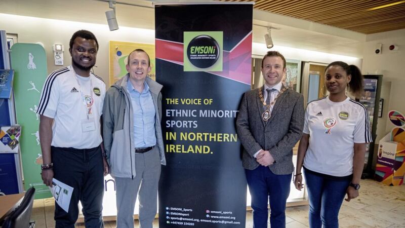 Kanmi Abayomi, founder/Chair of EMSONI, Dr David Russell, Chief Executive of the NI Human Rights Commission, Deputy Lord Mayor of Belfast, Councillor Peter McReynolds, and Funmi Abayomi , an EMSONI volunteer, at the recent seminar. 