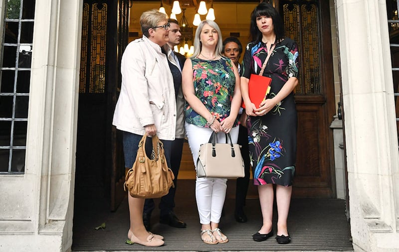 Northern Ireland campaigns manager for Amnesty UK Grainne Teggart (right) and Sarah Ewart, a woman from the north who travelled to England for an abortion (centre), outside the Supreme Court, Westminster prior to the Supreme Court ruling on Northern Ireland's abortion law&nbsp;