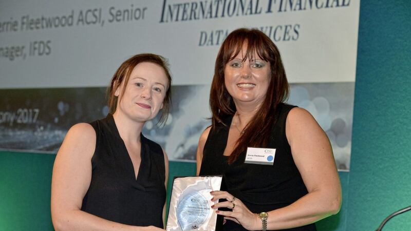 Jamesina Doble, director of investment management at Johnston Campbell, receives her CISI Operations Award from Kerrie Fleetwood, Director of Risk Compliance &ndash; Funds at International Financial Data Services (IFDS) at Mansion House, London 