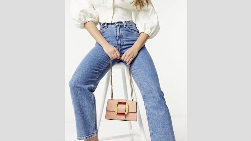ASOS DESIGN Cross Body Bag with Statement Buckle, &pound;18; ASOS DESIGN Recycled Farleigh High Waist Slim Mom Jeans in Mid Vintage Wash, &pound;32; ASOS DESIGN Denim Seamed Top with Puff Sleeve, &pound;28 