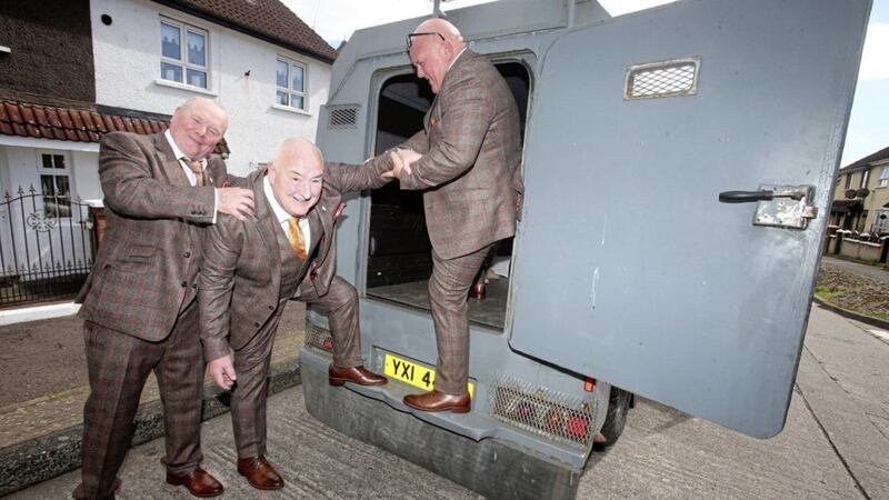 West belfast groom Maunuel Fryers gets a lift to his wedding in a RUC landrover with best men Gerard Fryers and Eamonn Duffin Picture Mal McCann. 