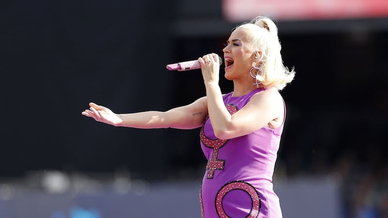 The singer debuted her growing bump in front of thousands of cricket fans in Melbourne.