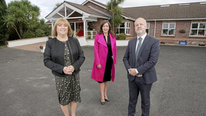 Domestic Care Group chief executive Lesley Megarity (left) and deputy chief executive John-Paul Watson with Gemma Jordan from Ulster Bank 