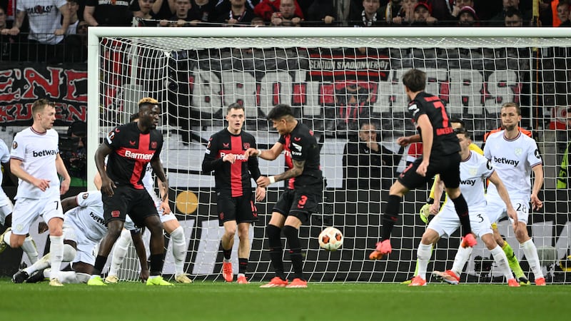 Bayer Leverkusen’s Jonas Hofmann scores their first goal