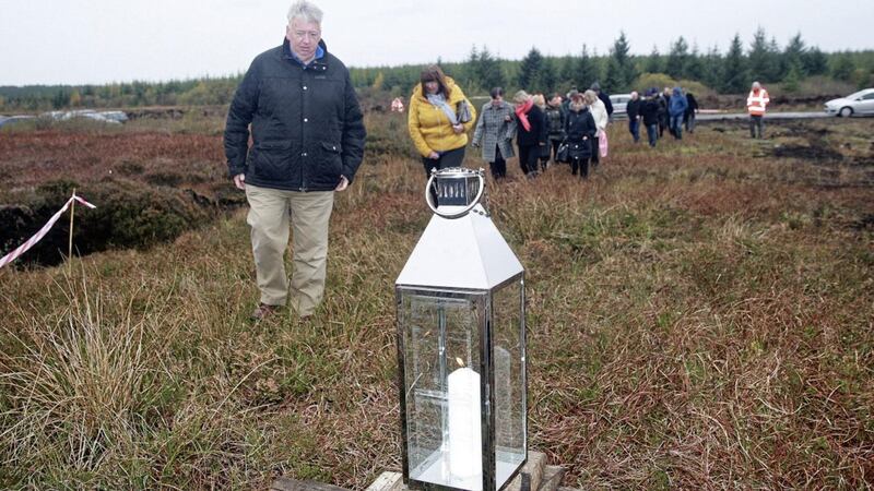 Oliver McVeigh with his sister Dympna Kerr, relatives of Columba McVeigh, at a bog in Emyvale, Co Monaghan during the search last year. Picture by Bill Smyth. 