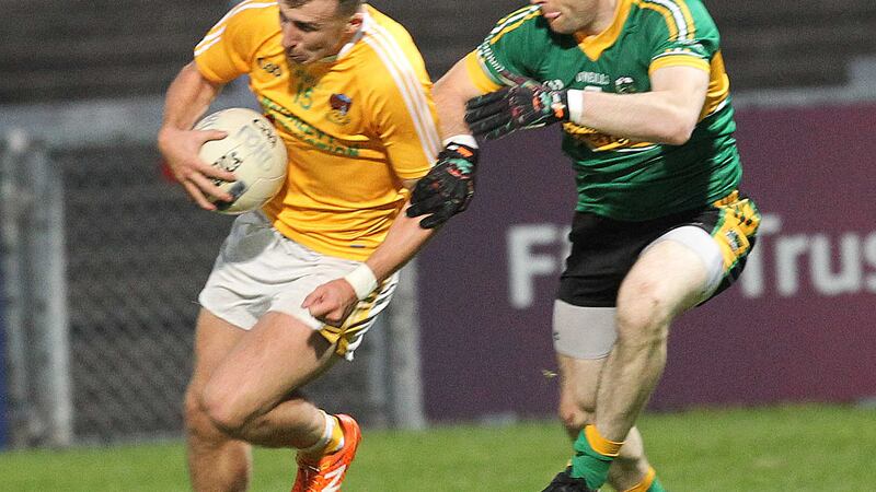Clonduff's Barry O&quot;Hagan battles his way past Bryansford's Luke Howard<br/>Picture by Philip Walsh&nbsp;