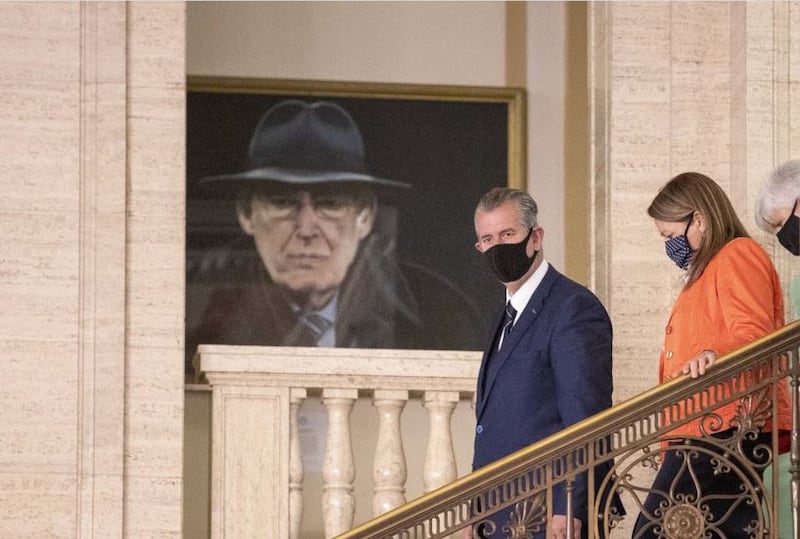 &nbsp;DUP leader Edwin Poots (left) with deputy leader Paula Bradley (centre) and Joanne Bunting MLA (right) pass a portrait of former party leader Ian Paisley, in the halls of Parliament Buildings, Belfast, to announce part of his new ministerial team at Stormont.