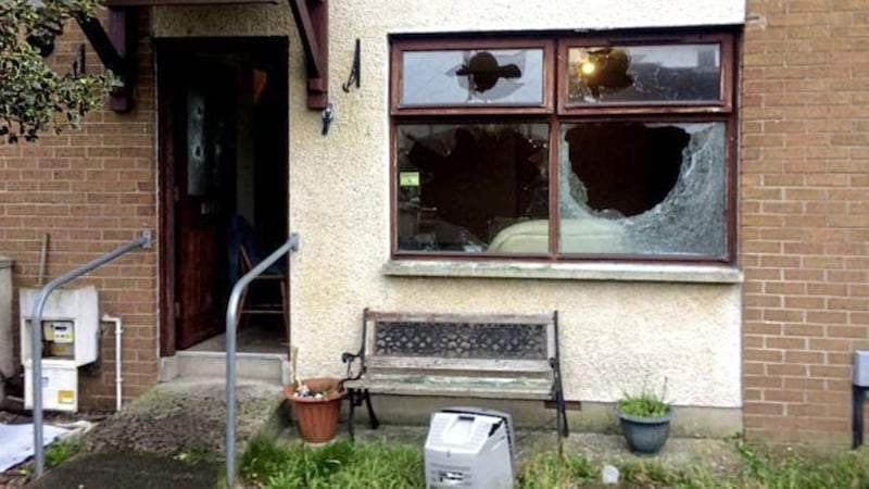 The men were attacked at a house in Hollybank Drive, Newtownabbey 