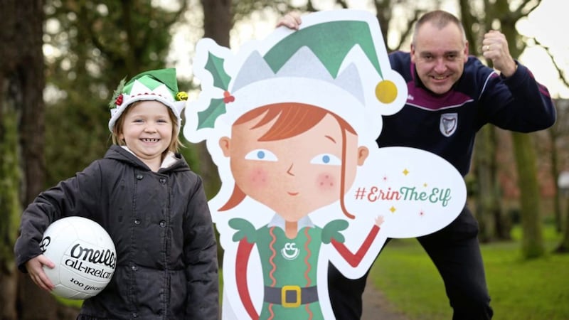&#39;Erin the Elf&#39; joined Bredagh GAC chairman, Malcolm MacFarlane at a special event to mark her fantastic work in raising awareness of the Children&#39;s Cancer Unit Charity 