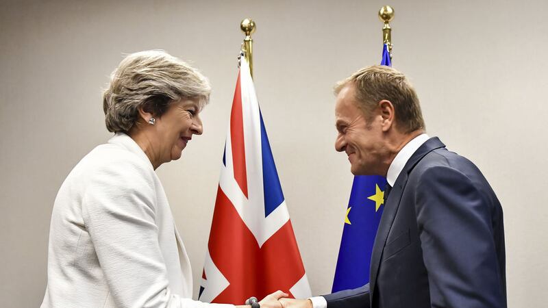 British Prime Minister Theresa May&nbsp;welcomed by European Council President Donald Tusk for a bilateral meeting during an EU summit in Brussels. Picture by Geert Vanden Wijngaert, AP Photo