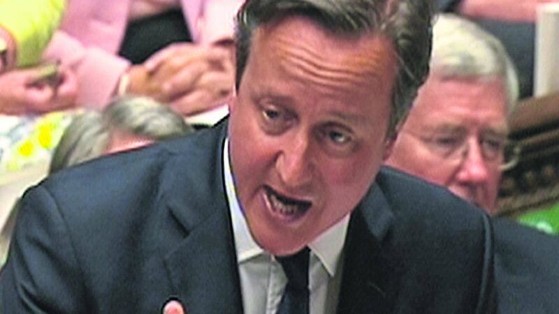 CHANGE: David Cameron speaks during prime minister&rsquo;s questions in the House of Commons yesterday 