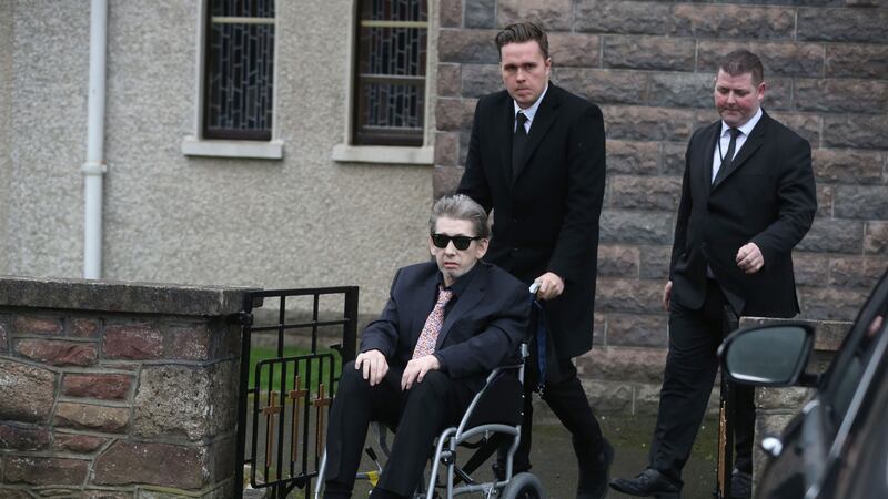 A wheel-chair bound Shane MacGowan is helped from the church as the funeral of his mother Therese MacGowan takes place  &nbsp;
