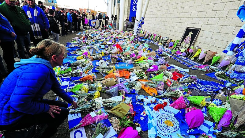 <address>Supporters pay tribute at Leicester City Foootbal Club following a helicopter used by club owner Vichai Srivaddhanaprabha, crashing into flames in a car park near the stadium shortly after 8.30pm on Saturday evening.&nbsp;