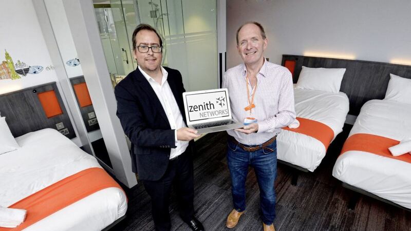 Martin Lyons from Zenith Networks is pictured with easyHotel Belfast director David Crowe 