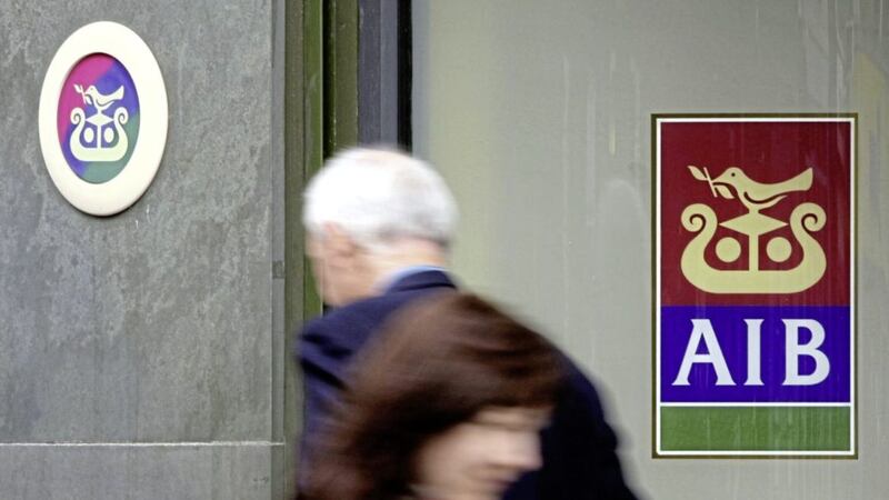 AIB reported a pre-tax loss of &pound;97m for its UK operation, which includes its 15 branches in the north. 