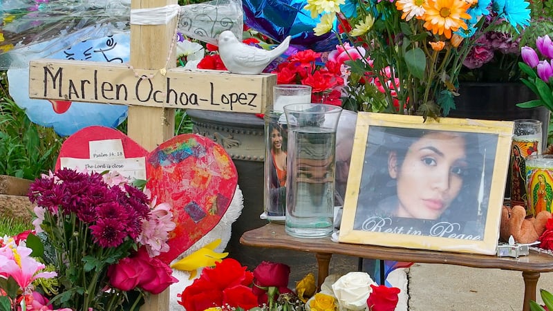 A memorial of flowers, balloons, a cross and photo of victim Marlen Ochoa-Lopez in Chicago in 2019 (Teresa Crawford/AP)