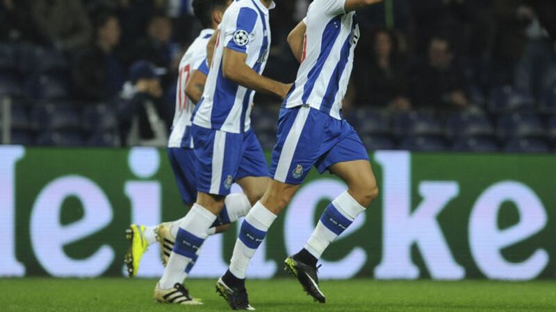 Porto's Andre Silva, right, celebrates after scoring the opening goal during a Champions League group G soccer match between FC Porto and Leicester City &nbsp;