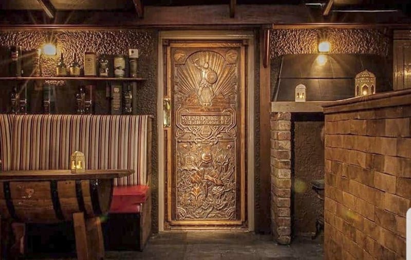 Mary McBride&#39;s Game of Thrones door, a nod to the locale&#39;s inclusion in the HBO TV series. Ciaran Gallagher's mural (inset).