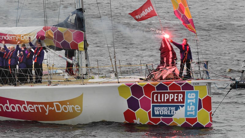 Derry man Danny Bryce lights the flare as the Derry boat arrives home in the Clipper Round the World Yacht Race