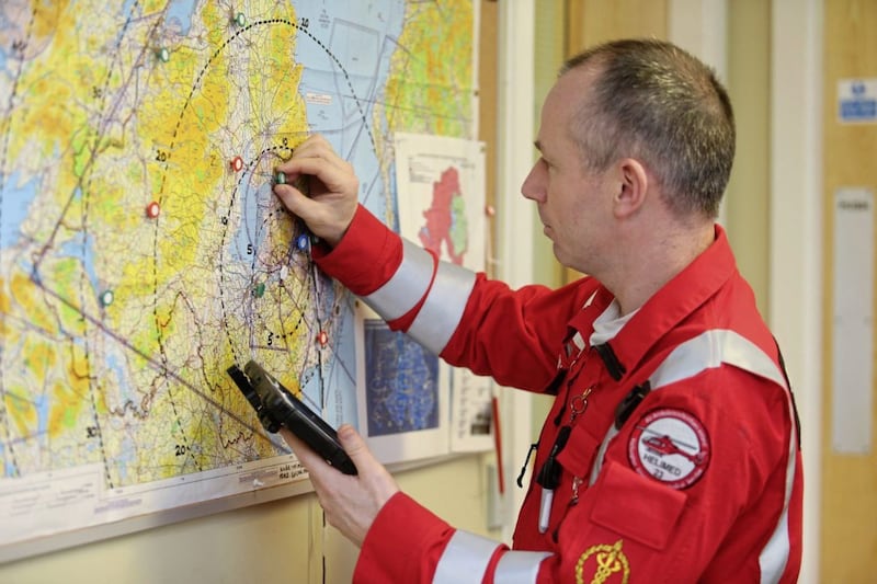 Air Ambulance operations lead Glenn O'Rorke plots a route Picture: Mal McCann