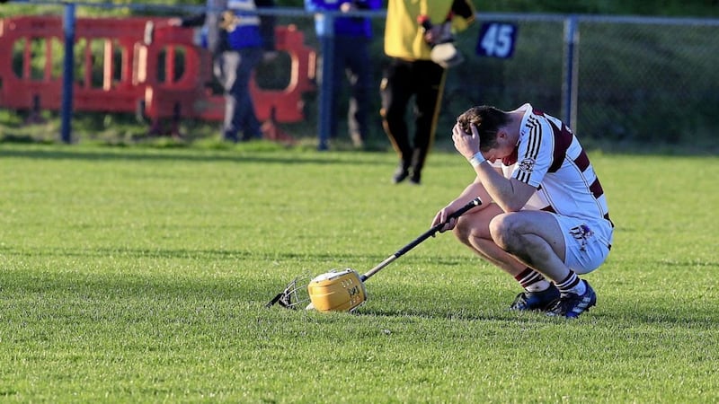 Slaughtneil&#39;s Ruairi McCartney is crestfallen after the Derry champions bowed out of Ulster yesterday. Pic Philip Walsh 