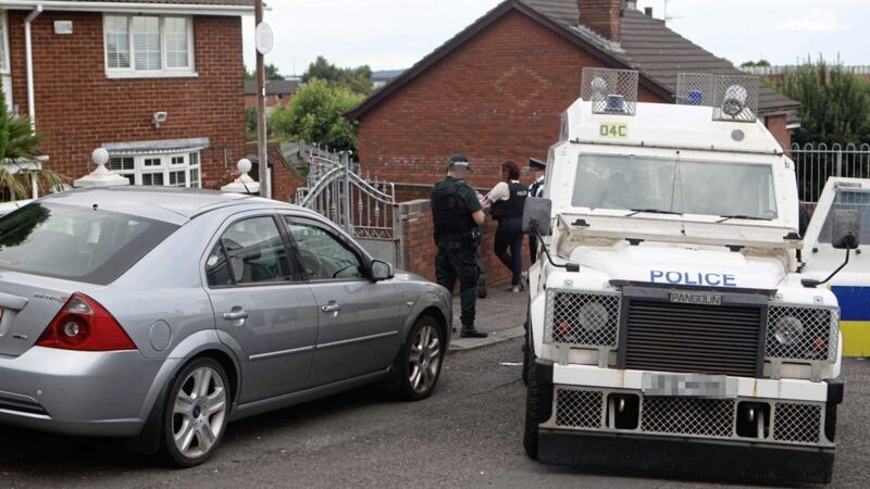 Houses were evacuated in Moyard Crescent in west Belfast as a police search took place. Picture Matt Bohill 