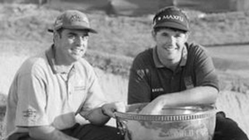 CUP OF JOY ... Ireland&rsquo;s Paul McGinley and Padraig Harrington with the World&nbsp;Cup of Golf at Kiawah Island after they finished with a combined total of 31 under&nbsp;par&nbsp;