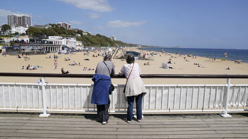 People look out from Bournemouth pier (Andrew Matthews/PA)