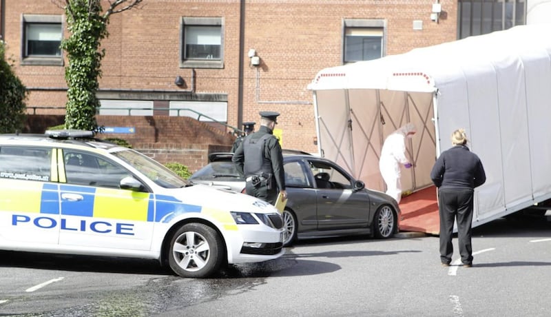 Police forensics remove a car from the grounds of Belfast City Hospital 