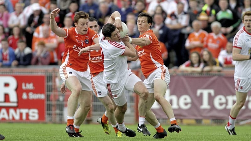 Sean Cavanagh (centre) is set to face his brother-in-law Charlie Vernon (left) as Tyrone meet Armagh again at Croke Park. Picture by Seamus Loughran 
