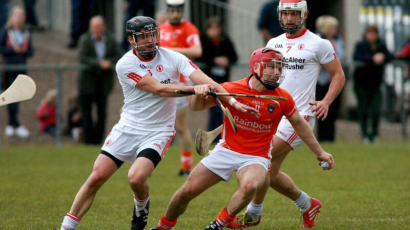 Armagh&#39;s Cahal Carvill under pressure from Tyrone&#39;s Justin kelly and Tiernan Morgan Picture by Seamus Loughran 