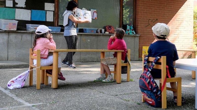 Children sit distanced from each other as their nursery school reopened in Ivrea, northern Italy. Picture by&nbsp;Fabio Ferrari, LaPresse via AP&nbsp;