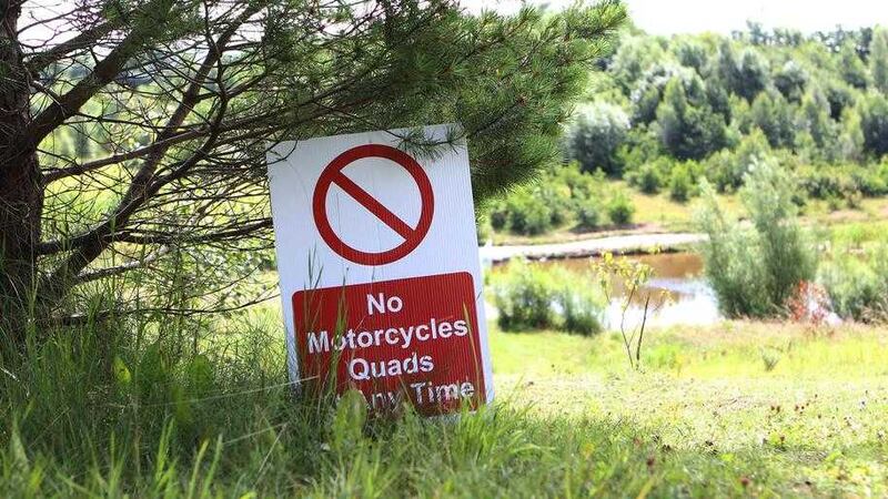 A sign forbidding motorcyles and quads in Colin Glen park, not far from the spot where Valerie Armstrong was struck by a scrambler. Picture Matt Bohill 