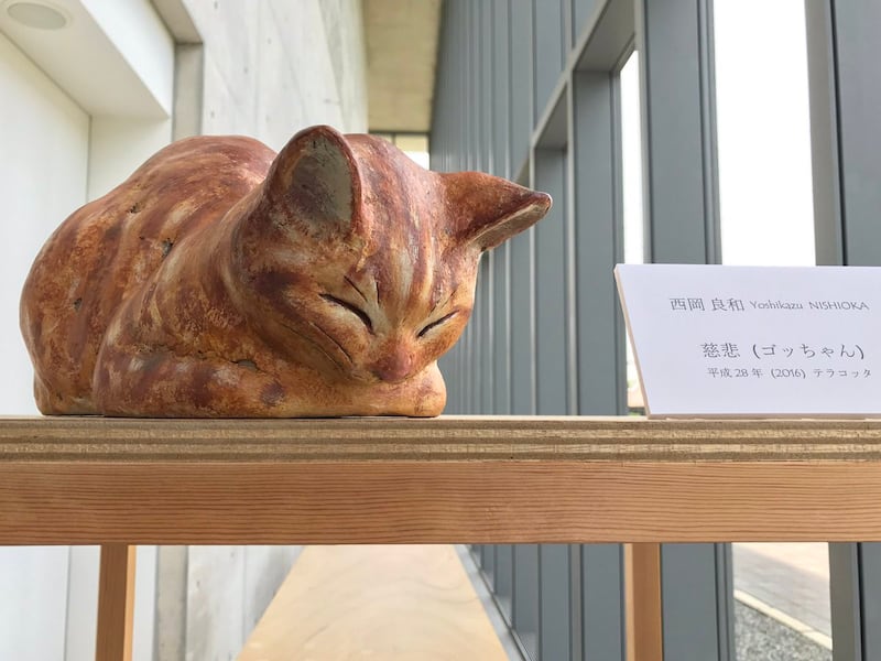 A ginger cat figurine
