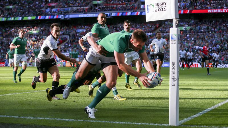 Ireland's Tommy Bowe goes over for a try during the Rugby World Cup clash with Romania at Wembley Stadium, London on Sunday September 27, 2015<br />&nbsp;