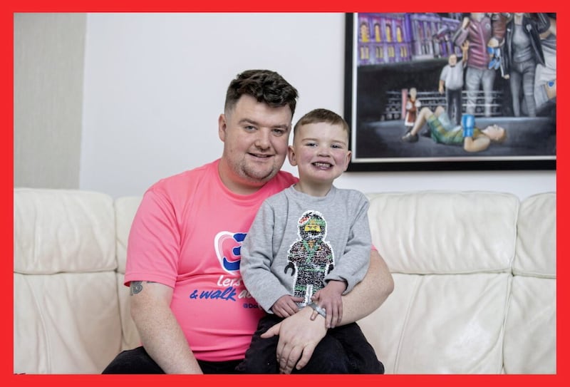 Daithi MacGabhann pictured with his dad, Mairtin. Picture by Liam McBurney/PA Wire 