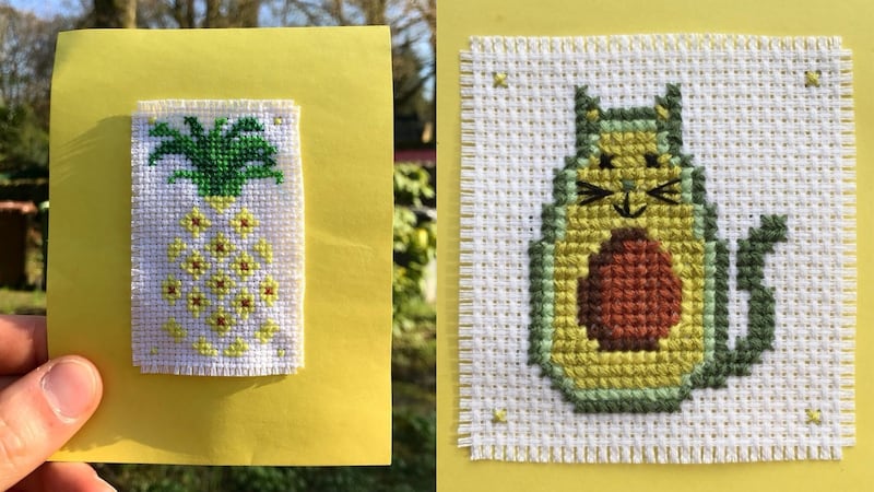 An embroidered pineapple and an embroidered cat