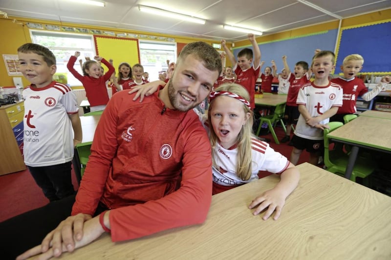 Tyrone player Michael Conroy at St John&#39;s PS, Moy ahead of the All Ireland football final, pictured with his sister Sarah. Picture by Hugh Russell 