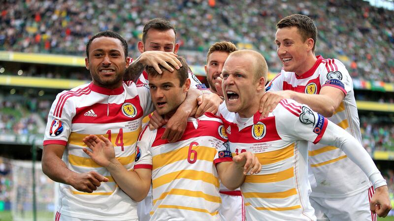 <address>Scotland's Shaun Maloney (centre) celebrates his equaliser against Ireland during Saturday night's European Championship qualifier at the Aviva Stadium<br/>Picture: PA