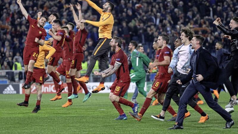 Roma players celebrate reaching the semi-finals of the Champions League after a 3-0 second leg win over Barcelona 