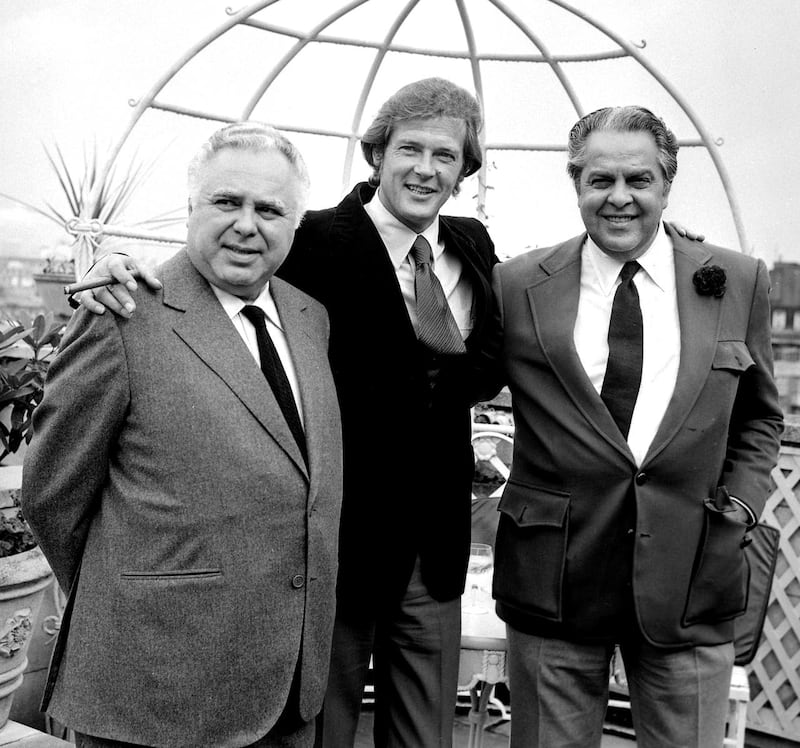 Roger Moore with producers Albert R Broccoli (right) and Harry Saltzman (left)