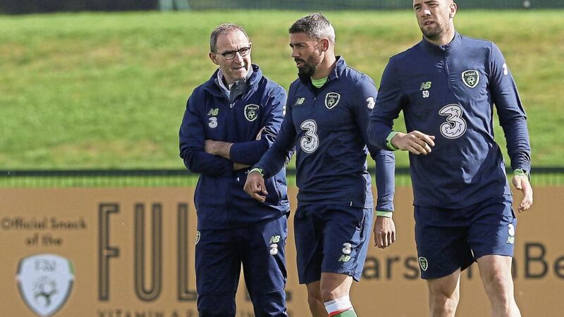 Republic of Ireland manager Martin O&#39;Neill in conversation with Jon Walters during a training session at the FAI National Training centre, Abbotstown on Wednesday. Walters is expected to be fit to lead the line against Georgia on Saturday 