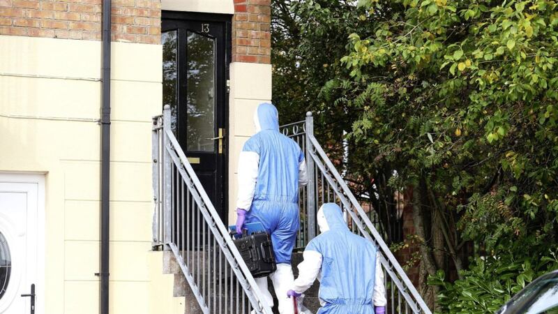 Police and Forensic officers at the scene of the death of a woman in her 60&#39;s at Larkspur Rise in west Belfast Picture Mal McCann. 