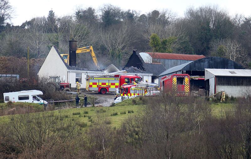 The scene of a fire in Derrylin which left three people dead. A 27-year-old man has been arrested on suspicion of murder. Picture Mal McCann&nbsp;