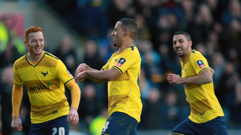 Oxford United's Kemar Roofe celebrates scoring his side's third goal during the Emirates FA Cup third round match at the Kassam Stadium on Sunday<br />Picture by PA&nbsp;