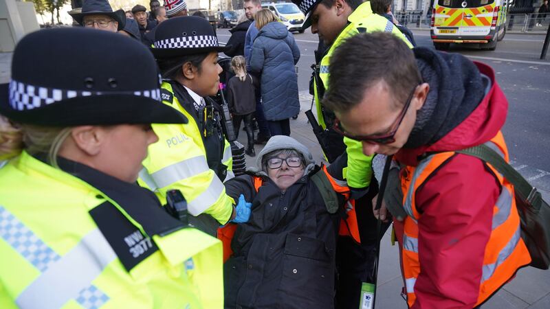 The Metropolitan Police and Just Stop Oil have accused each other of blocking an ambulance during a slow march by climate activists on Waterloo Bridge (Lucy North/PA)