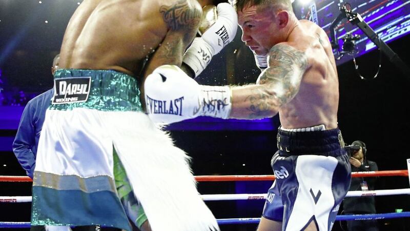 Carl Frampton lands a left hook to the body of Tyler McCreery in Las Vegas. Photo: Mikey Williams/Top Rank 