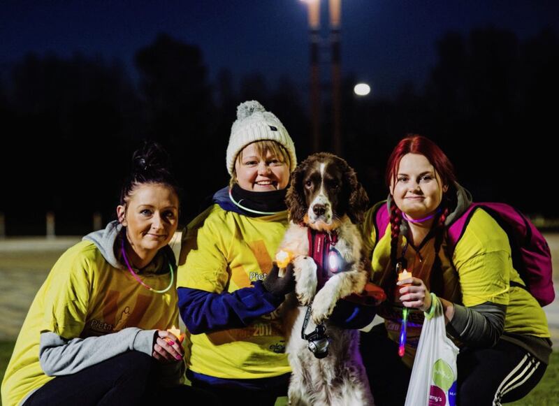 Heather McCleanaghan,Jo Venus,Chloe McCluskey and Co Co the dog pictured at the Dartkness into Light Suicide awarness walk at V36 in Newtownabbey. Picture John Murphy Aurora PA. 